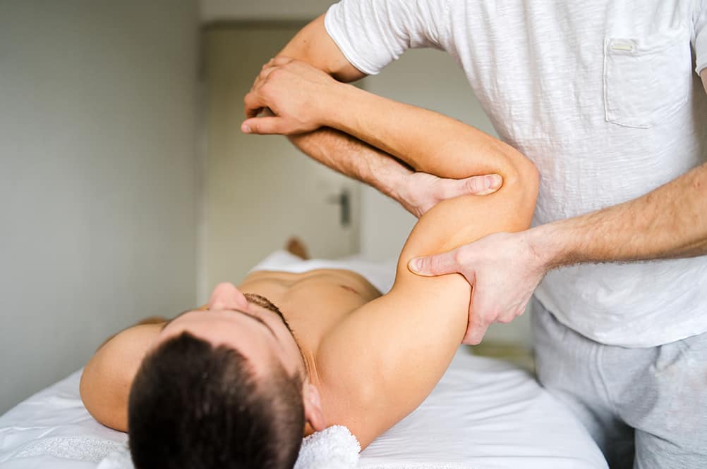 deep tissue massage on arm