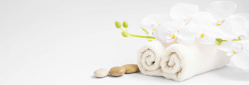 spa compliments towel and stones